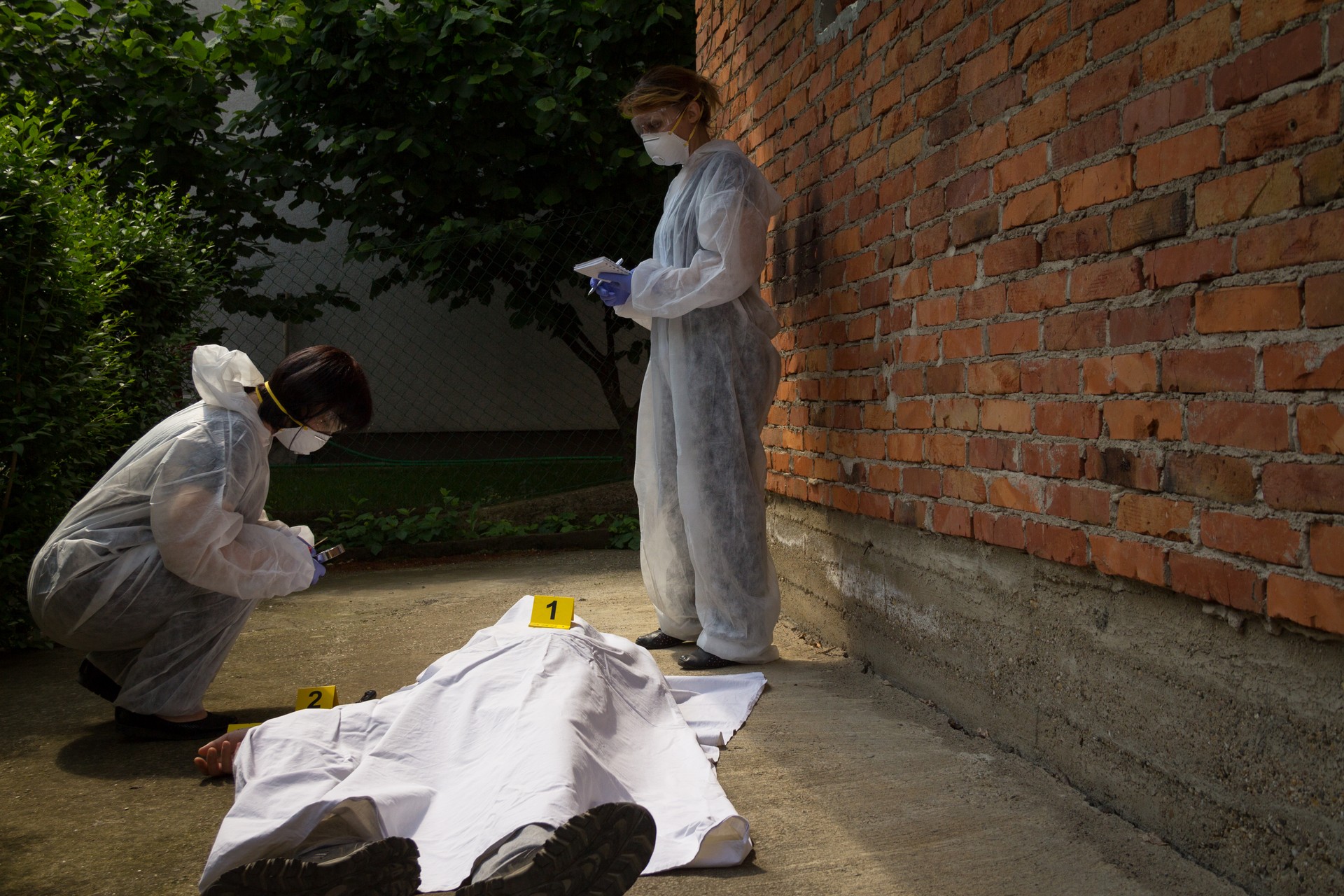 Forensic team bij een crime scene , opkuisen na een ongeval of moord